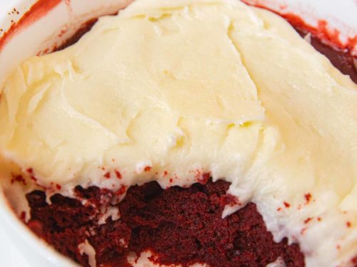 Microwave Red Velvet Cake with bites take out in cereal bowl
