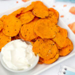Sweet Potato Chips on plate with dip