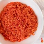 Microwave Flamin' Hot Cheetos Ramen in bowl