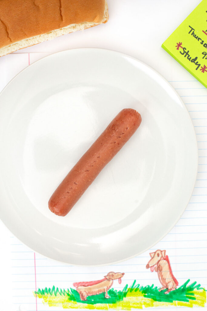 Microwave Hot Dog cooked wiener on plate