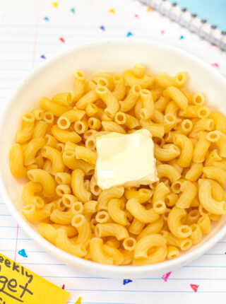 Microwave Pasta in bowl with pat of butter